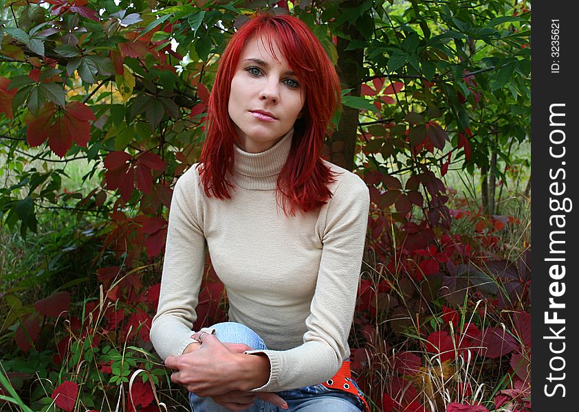 Beautiful sad girl with red hair. Beautiful sad girl with red hair