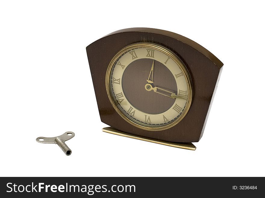 Wooden clock and winder isolated other white background