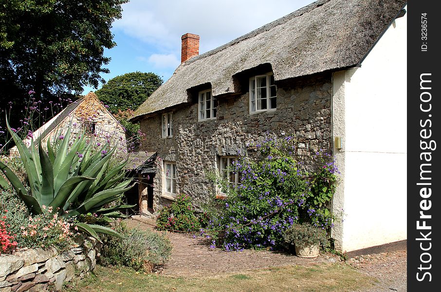 Idyllic Thatched Cottage and garden in a Rural English Village. Idyllic Thatched Cottage and garden in a Rural English Village