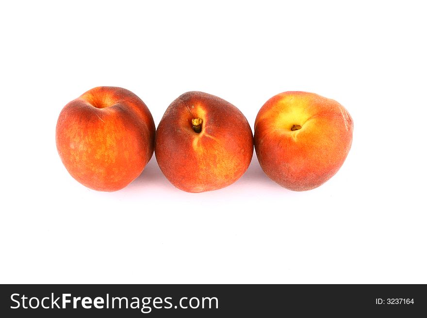 Ripe Peach with Leaf on White Background