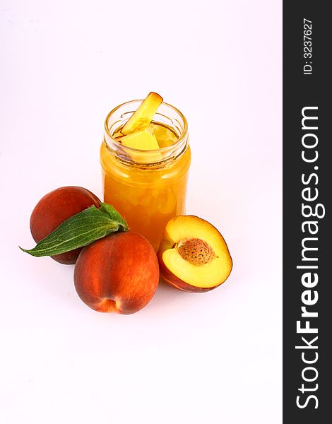 Peach jam on white background in jar. Peach jam on white background in jar