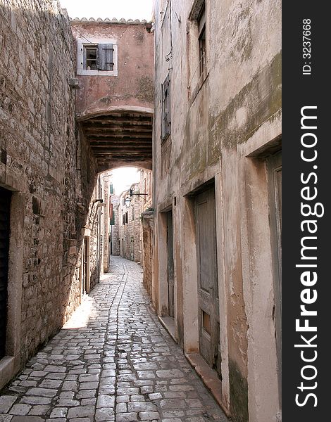 The street in an old Mediterranean city in the morning. The street in an old Mediterranean city in the morning