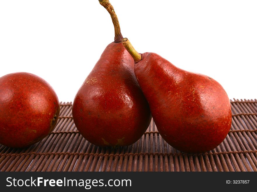 Pear and half of pear on white background