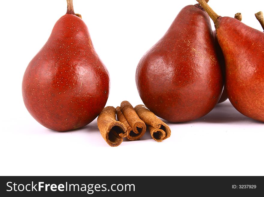 Pear and half of pear on white background