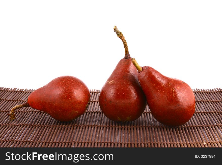 Pear and half of pear on white background