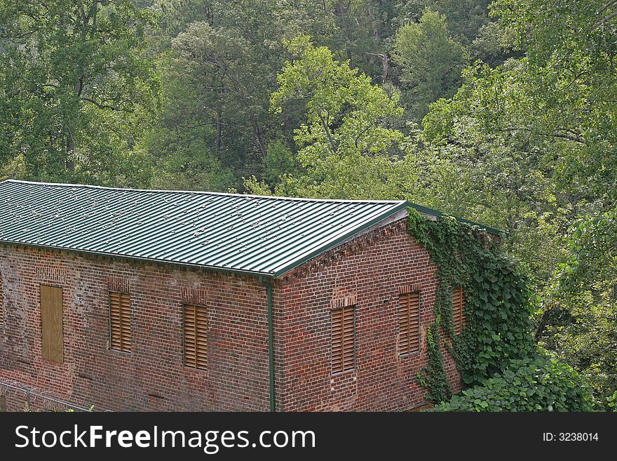 An old mill house in the trees