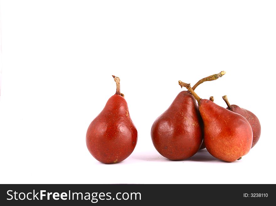 Pear and half of pear on white background