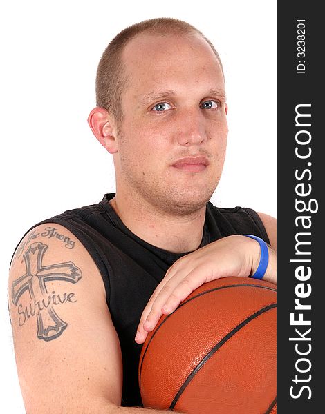 A young man with bright blue eyes and a basketball! Isolated over white!. A young man with bright blue eyes and a basketball! Isolated over white!