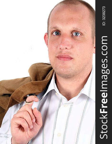 A studio portrait of a young businessman with his jacket! Isolated over white!