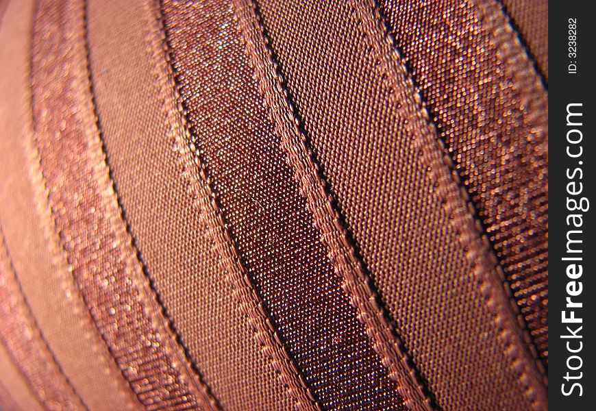 Brown satin material texture striped. Brown satin material texture striped.