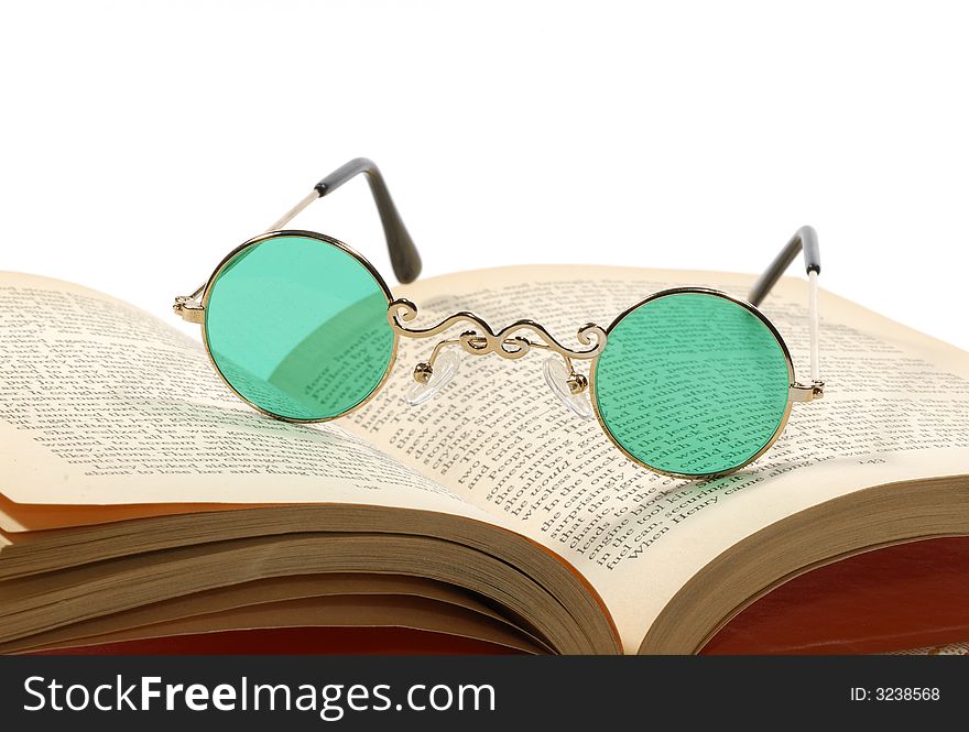 Photo of Bifocals on a Book - Reading Concept