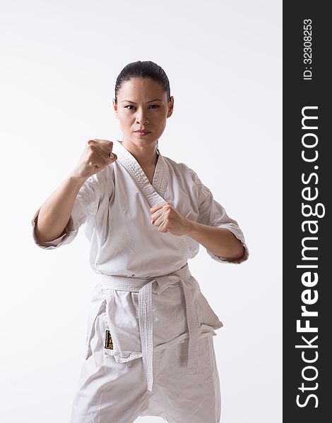 Asian woman in kimono show block in martial art exercise. Asian woman in kimono show block in martial art exercise