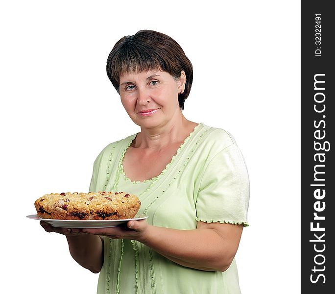 Portrait of a middle-aged woman holding a home-baked