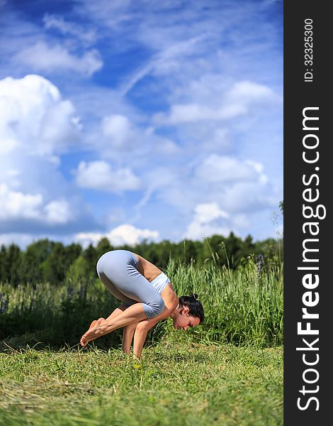 Girl doing yoga outdoor, vertical. Girl doing yoga outdoor, vertical