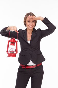 Businesswoman With Red Kerosene Lamp Stock Photos Businesswoman With Red Kerosene Lamp Stock Photos