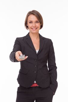 Businesswoman With Remote Control On White Royalty Free Stock Images Businesswoman With Remote Control On White Royalty Free Stock Images