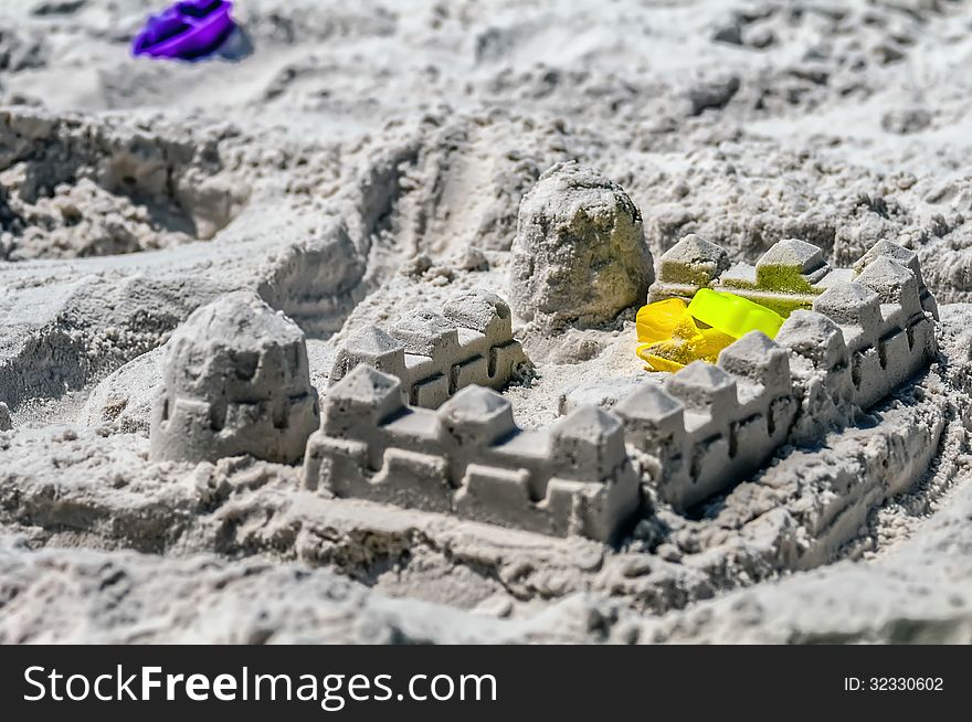 Sand castle structures built at seashore