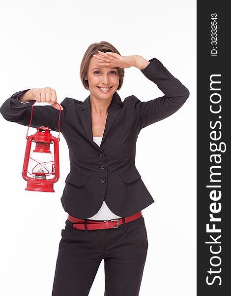 Businesswoman  with red kerosene lamp