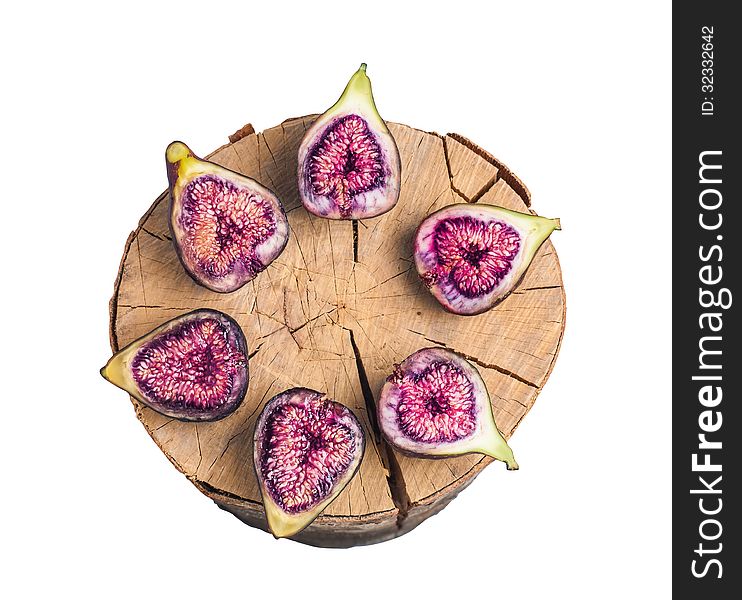 Fruits figs and wooden stump on white background. Fruits figs and wooden stump on white background