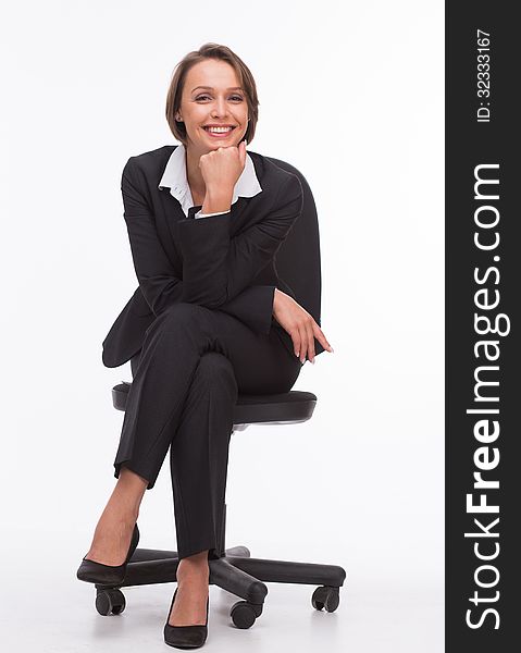 Businesswoman sit on chair isolated with white