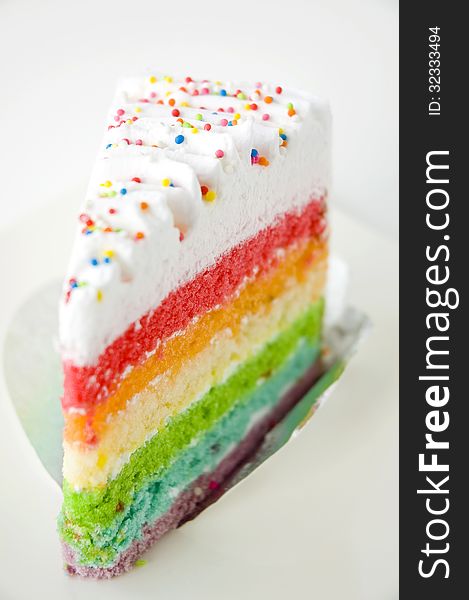 Close up rainbow cake on plate