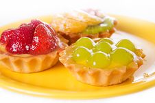 Glazed Fruit Cakes On Plate Stock Photo