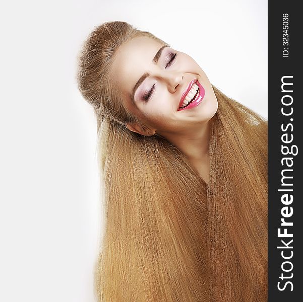 Sincere Smile. Jubilant Young Woman With Flowing Healthy Hairs. Pleasure