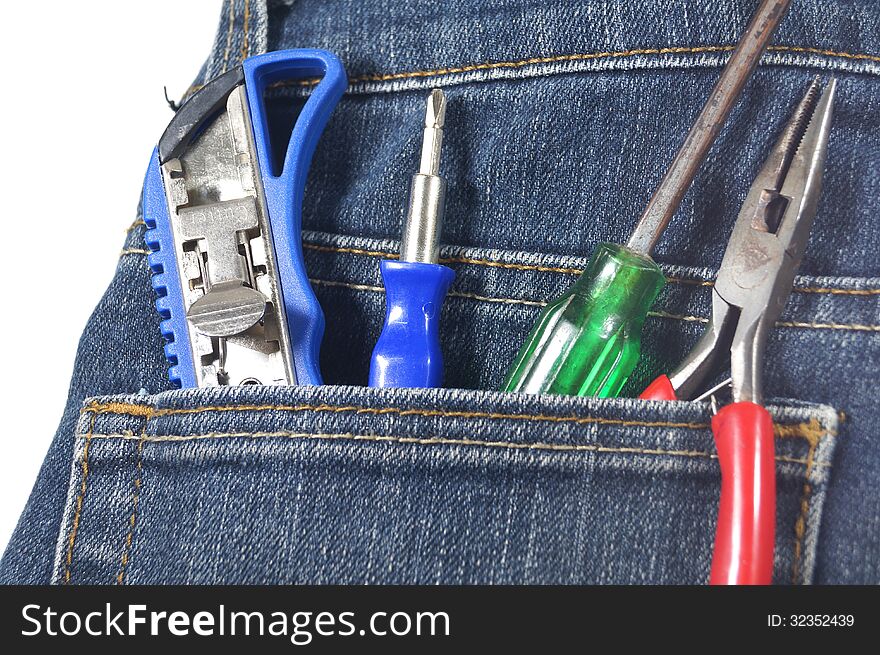Knife,screw, cutter and pincers in jean s pocket