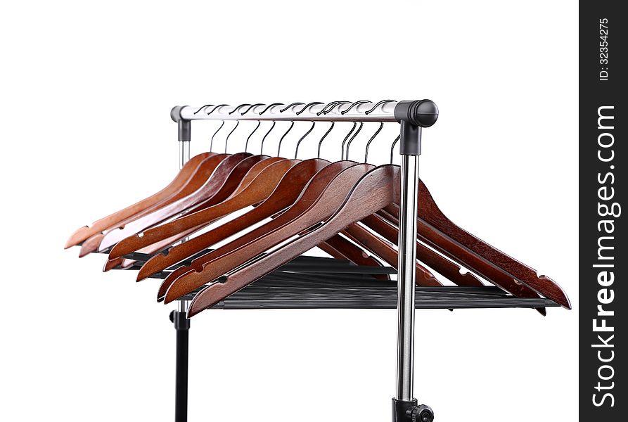 Wooden clothes hangers isolated on a white background