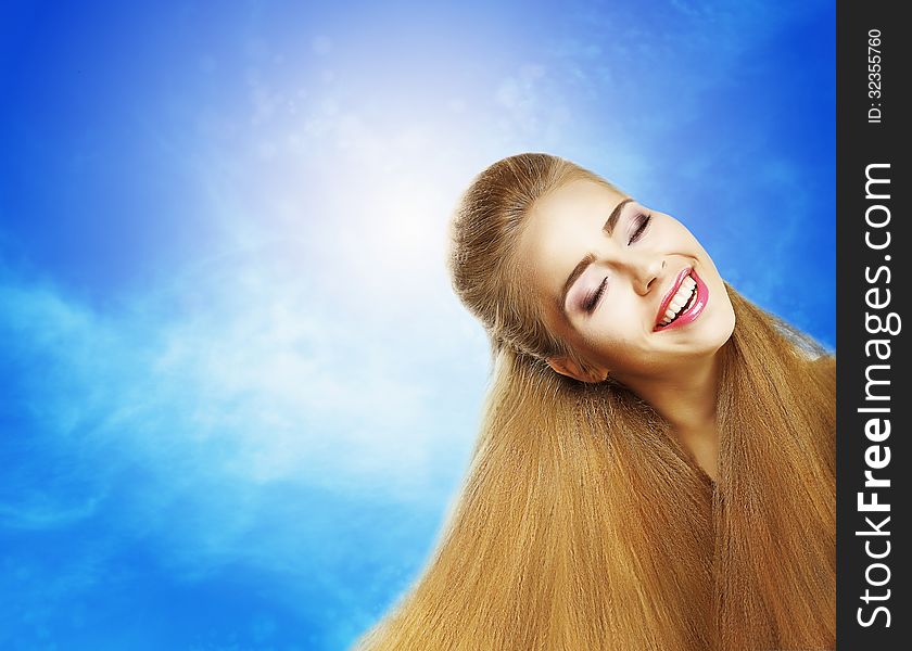 Positive Emotions. Portrait Of Laughing Teen Girl Over Sunny Blue Sky. Jubilance