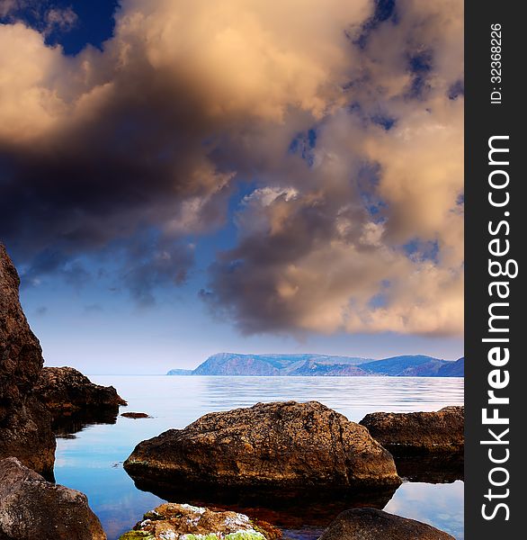 Summer landscape with clouds over the sea