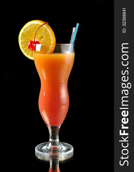 Cocktail smoothies tropical fruit on a black background