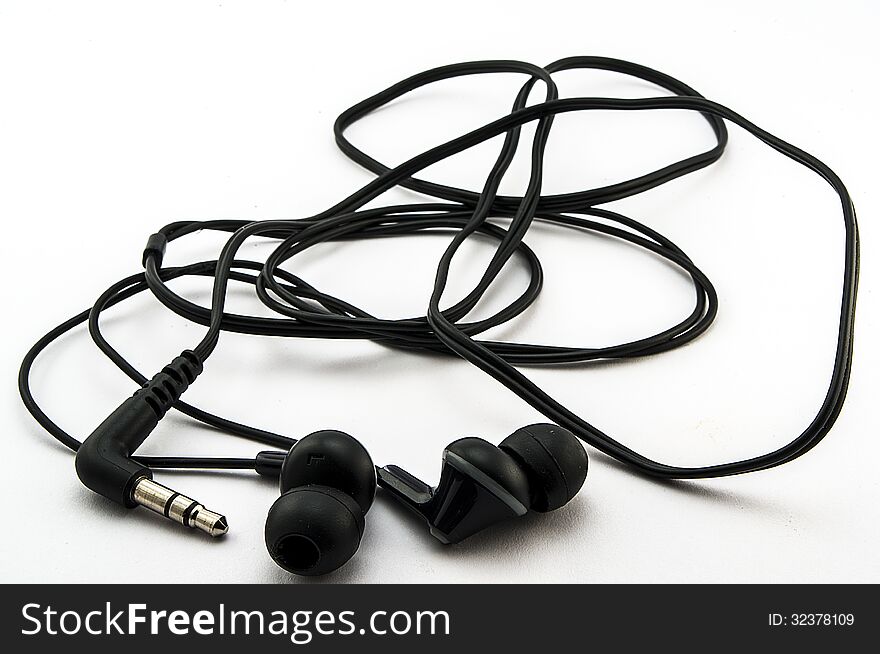 Vacuum black headphones on white background