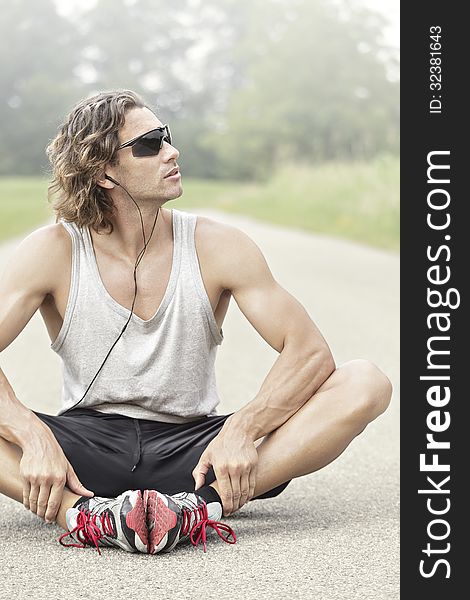 Athlete With Sunglasses Looks Away