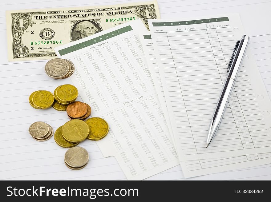 Earning money and expenses, tip chart and paperwork