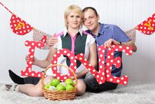 Happy Pregnant Wife And Husband Sit On Carpet Royalty Free Stock Images Happy Pregnant Wife And Husband Sit On Carpet Royalty Free Stock Images