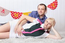 Happy Pregnant Wife And Husband Lie On Carpet Royalty Free Stock Photo Happy Pregnant Wife And Husband Lie On Carpet Royalty Free Stock Photo