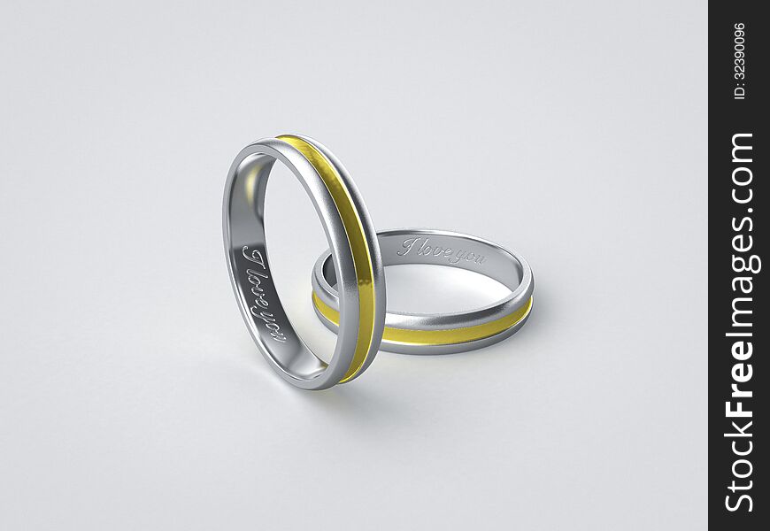 Pair of inscripted silver golden wedding rings