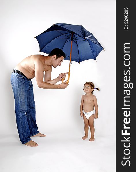 Picture of happy family - father with daughter under umbrella