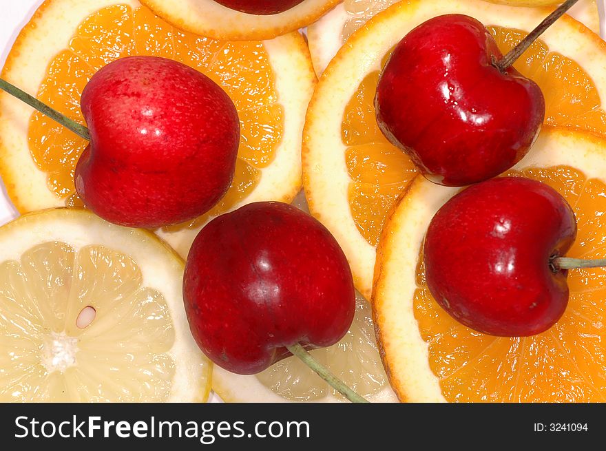 Slices of lemon,orange, and cherries. Slices of lemon,orange, and cherries