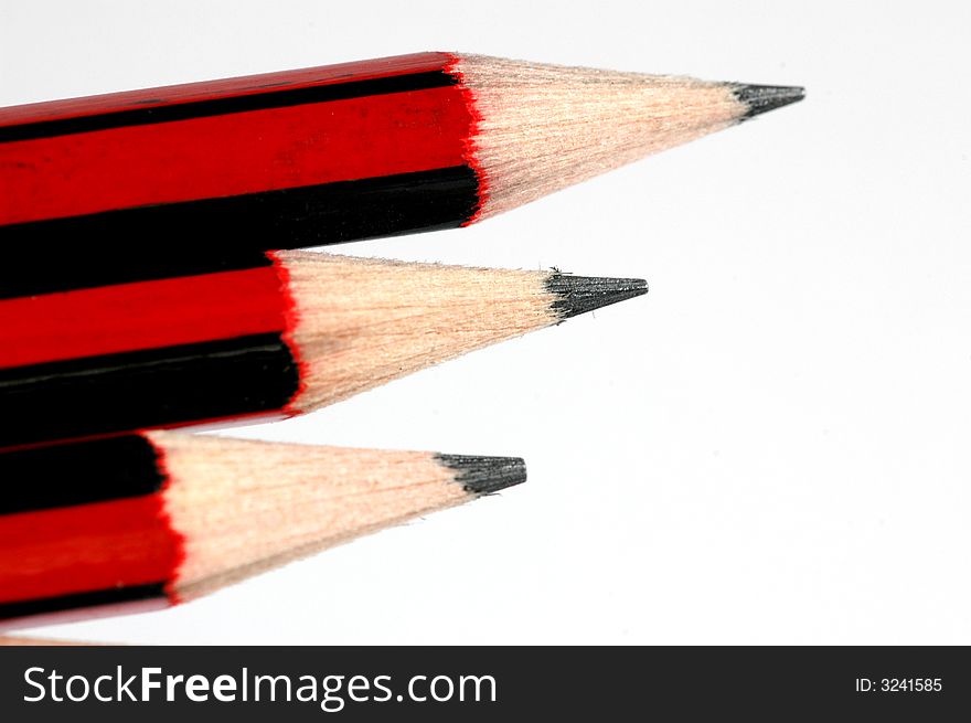 Three pencils red and black
