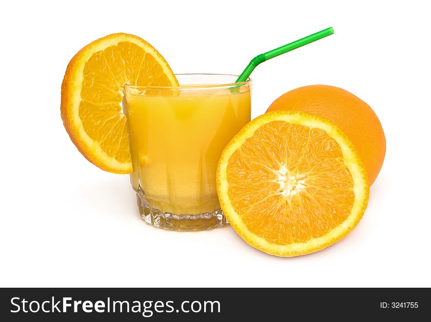 Glass of orange juice with a straw and oranges isolated on a white background