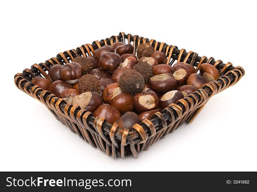 Chestnuts in a gasket isolated on a white background