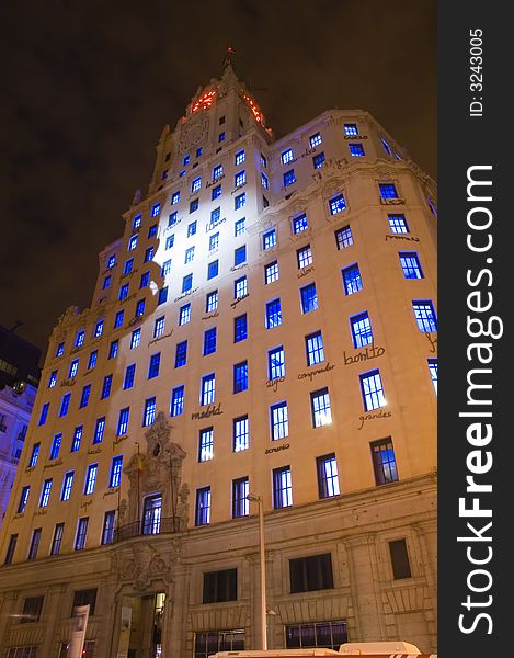 The Telefonica Building on Gran Via covered in words and illuminated with a spot light. Images from the Noche En Blanco / White Night festival in Madrid, Spain 2007.