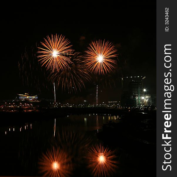 Firework and its reflection in Putrajaya. Firework and its reflection in Putrajaya.