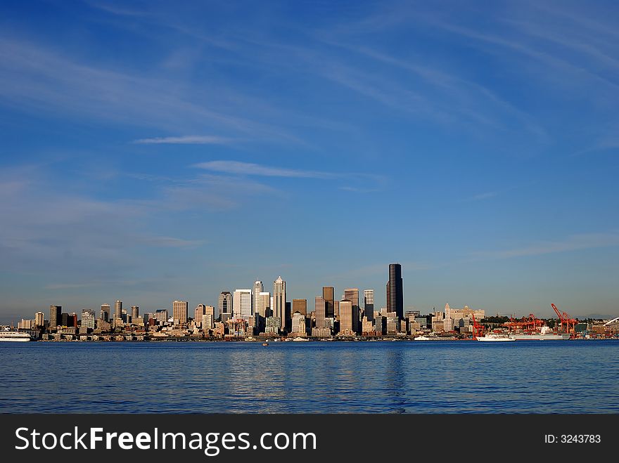 Seattle Skyline and beautiful blue sky accorss the water. Seattle Skyline and beautiful blue sky accorss the water