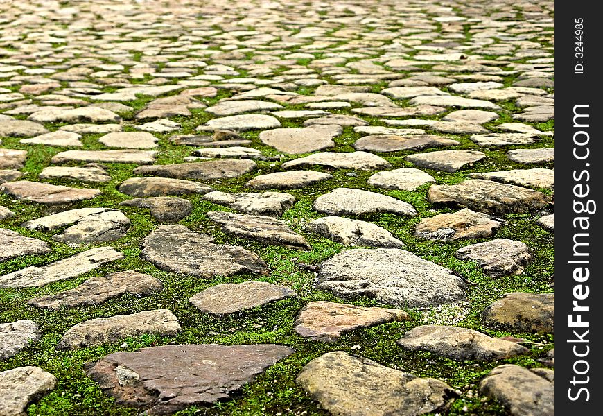 Landscape photo of random stone paved surface with shallow focus. Landscape photo of random stone paved surface with shallow focus.