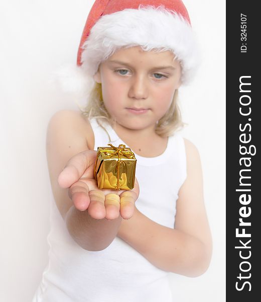 Child santa holding the gift. Child santa holding the gift