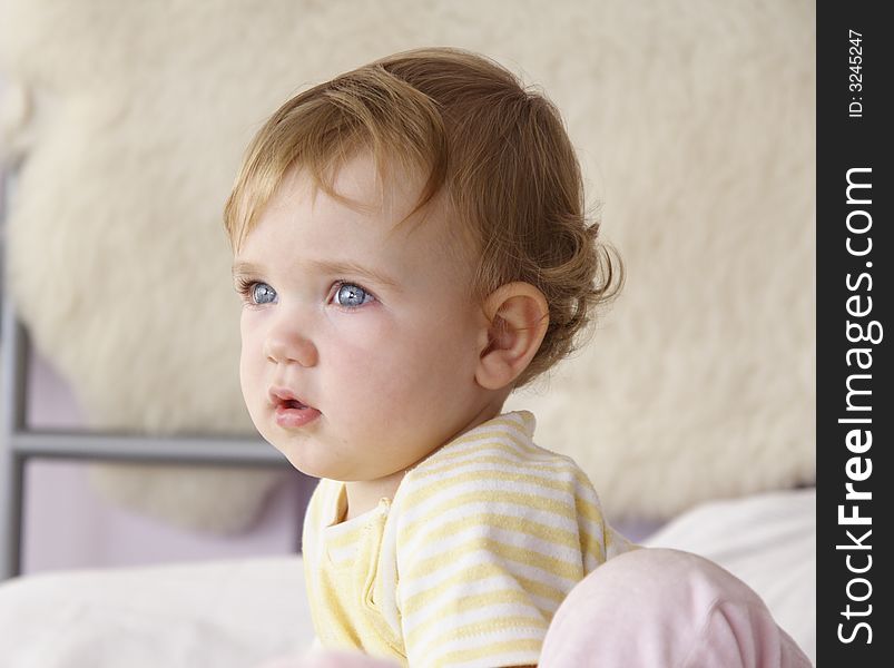 A baby, who looks a bit confused. A baby, who looks a bit confused.