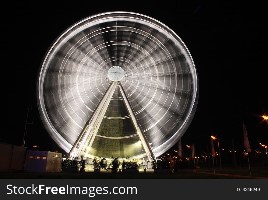 Ferry wheel in a city.